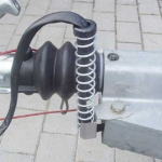 Cable protection trailer spring